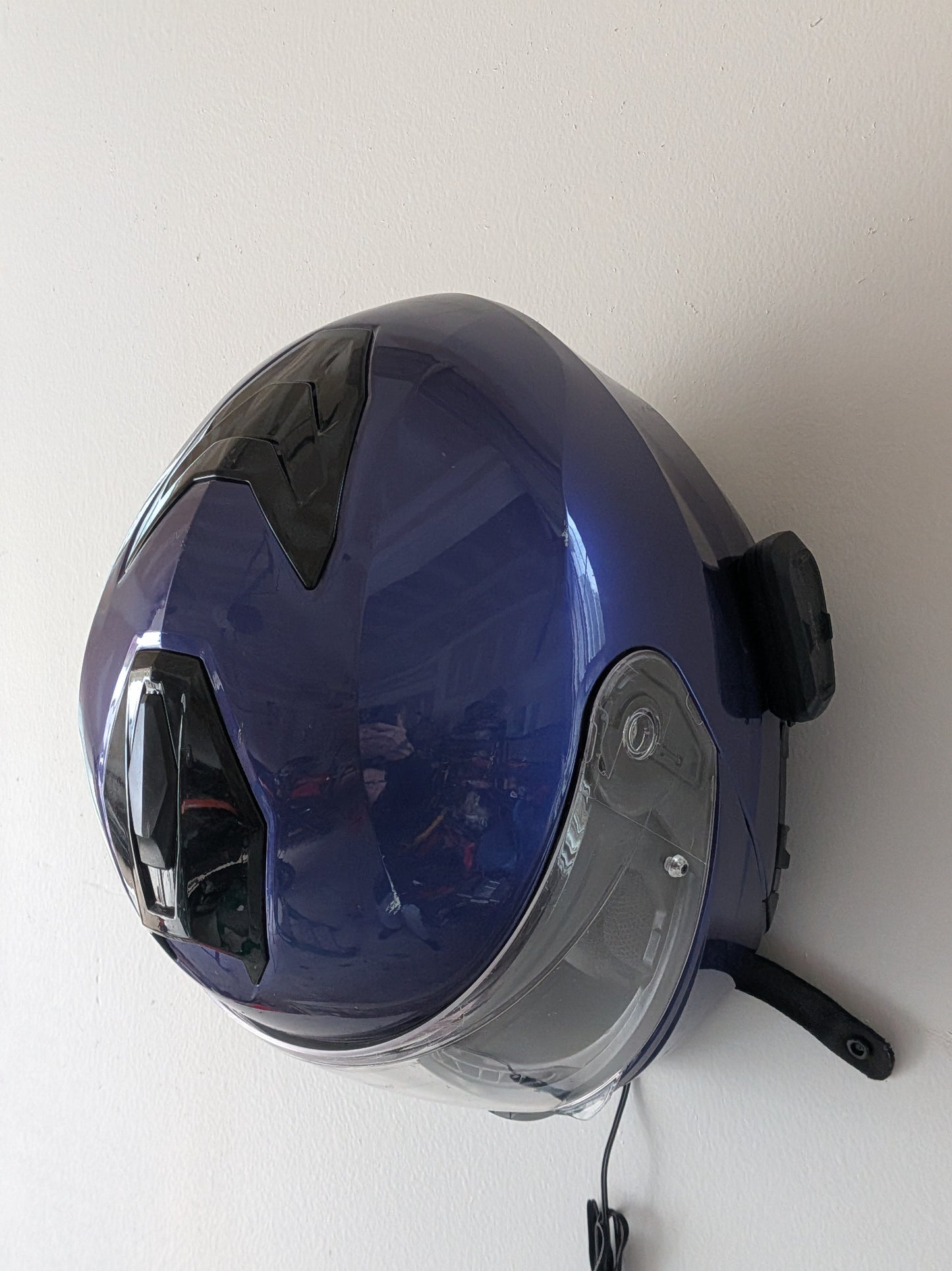 TorqueHook™ – Helmet & Gear Wall Organizer with Built-In USB-C Charging Port