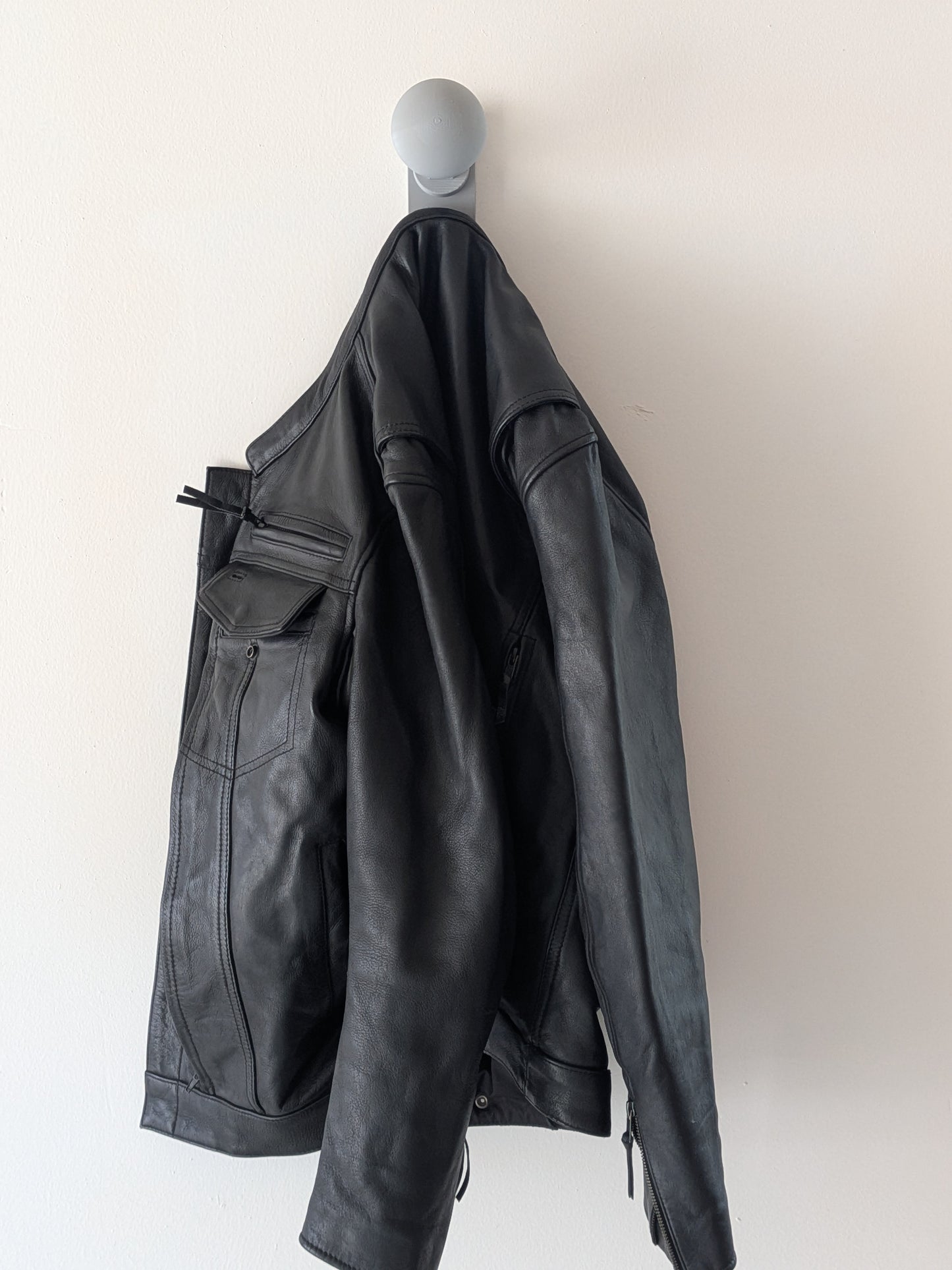 TorqueHook™ – Helmet & Gear Wall Organizer with Built-In USB-C Charging Port