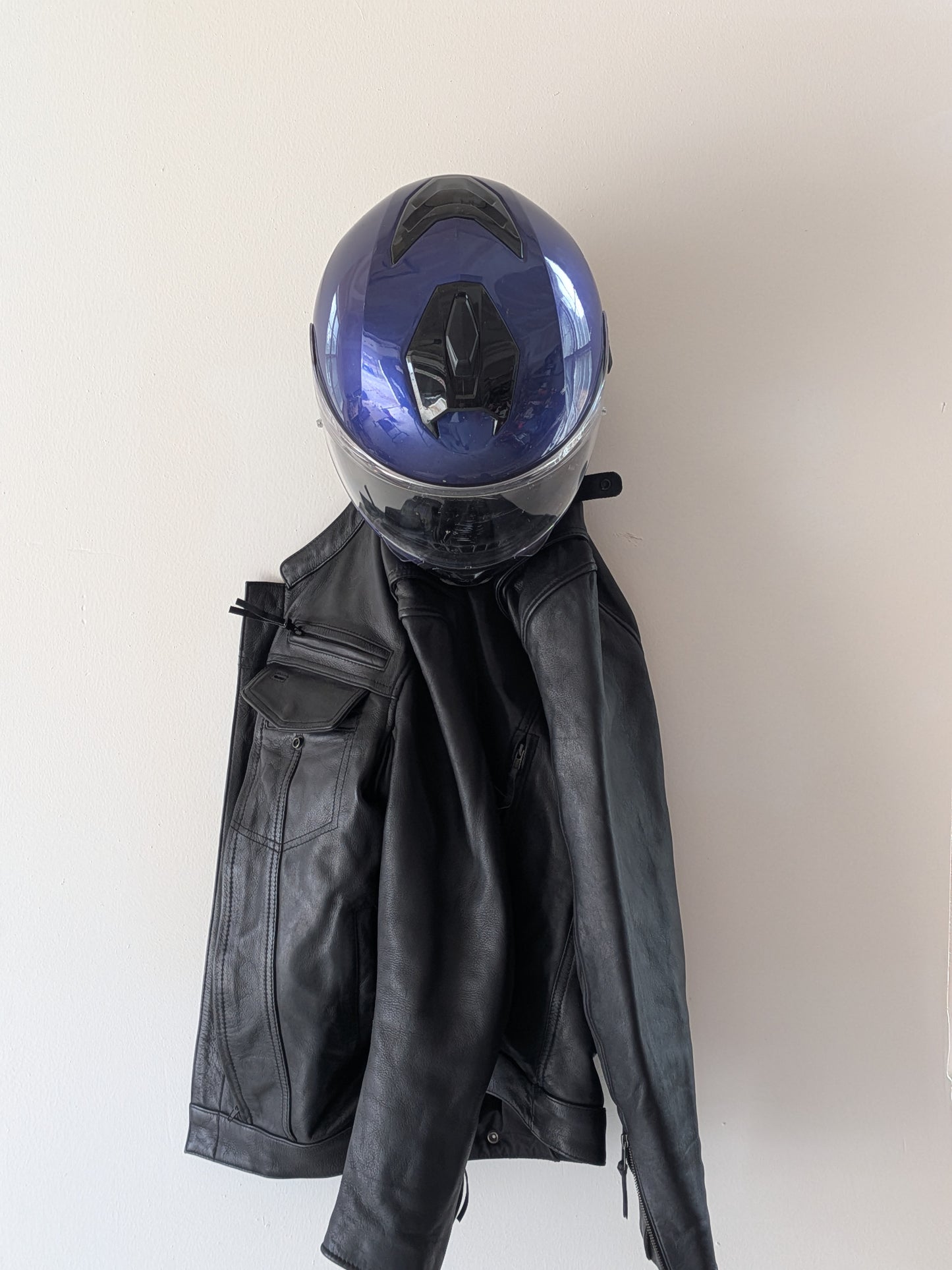 TorqueHook™ – Helmet & Gear Wall Organizer with Built-In USB-C Charging Port