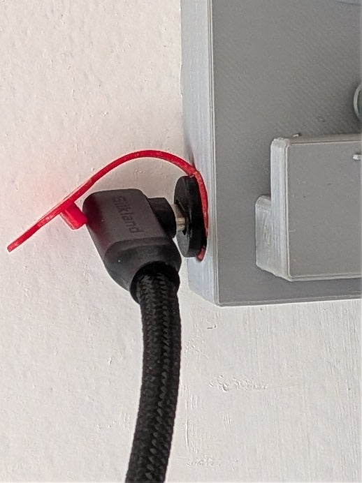 TorqueHook™ – Helmet & Gear Wall Organizer with Built-In USB-C Charging Port