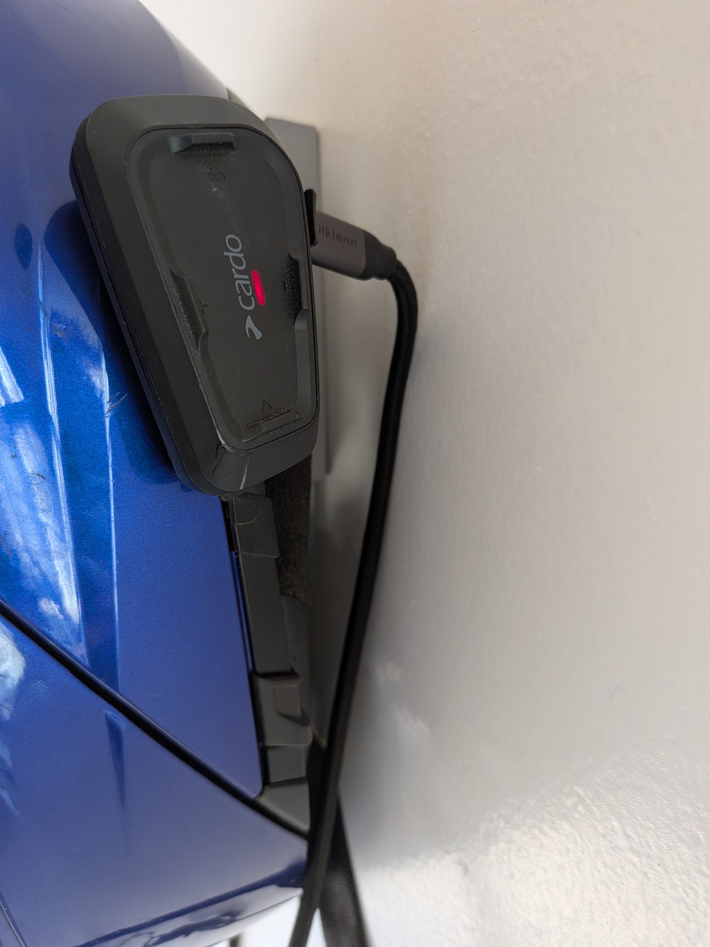 TorqueHook™ – Helmet & Gear Wall Organizer with Built-In USB-C Charging Port