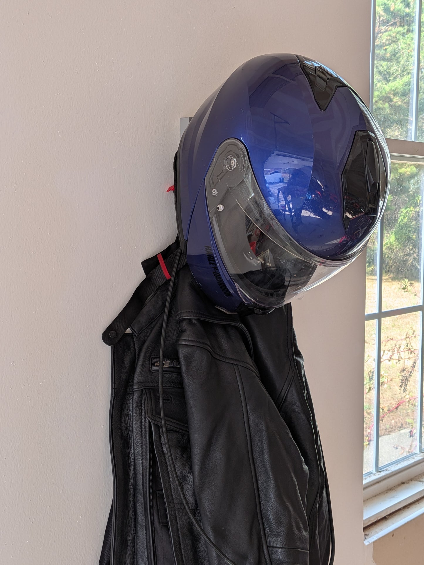 TorqueHook™ – Helmet & Gear Wall Organizer with Built-In USB-C Charging Port