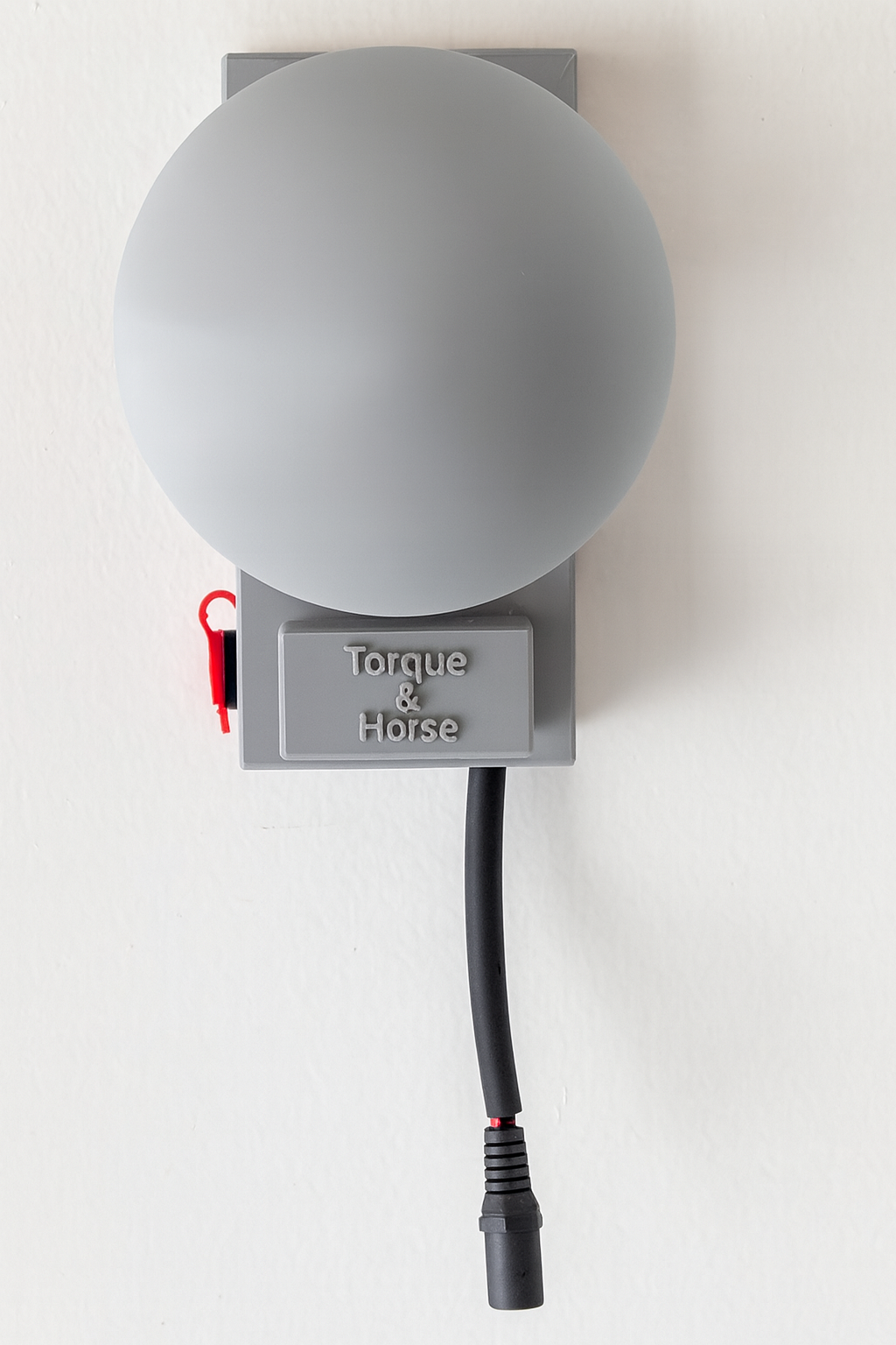 TorqueHook™ – Helmet & Gear Wall Organizer with Built-In USB-C Charging Port